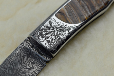 Voir la collection des gravures sur couteaux